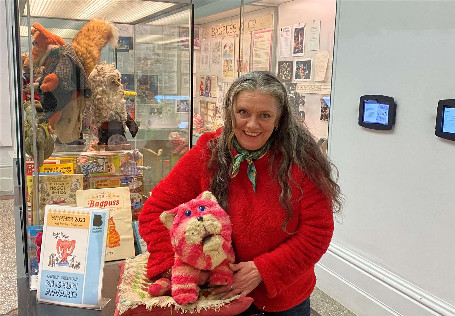 Emily Firmin poses with Bagpuss in The Beaney in Canterbury