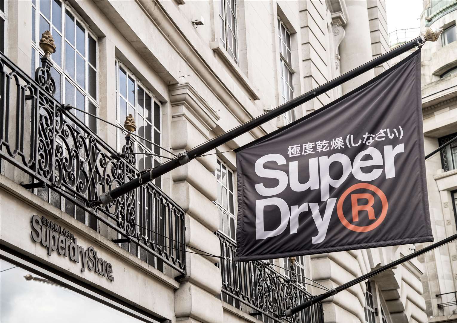 Superdry runs 216 shops alongside franchised stores (Ian West/PA)