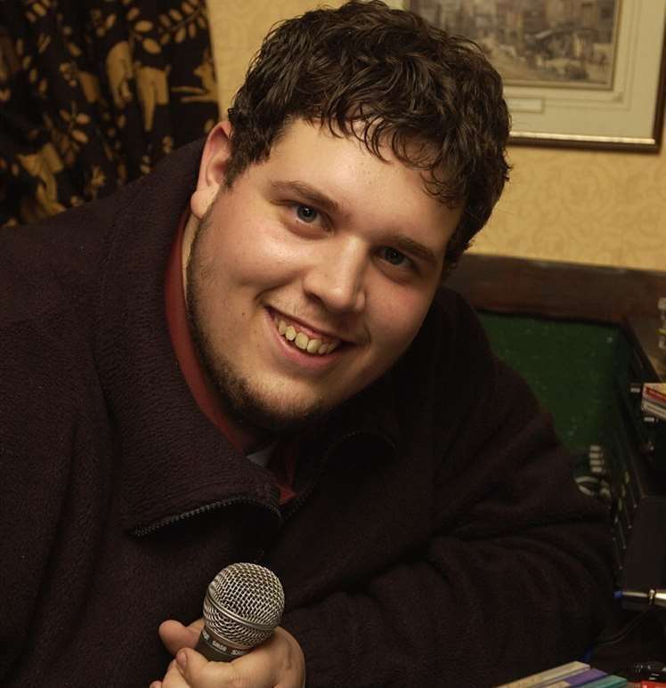 Rick Waller visited the Upper Bell, Chatham for a charity karaoke night in 2001
