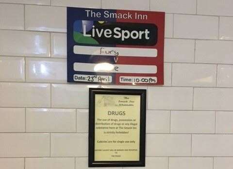 Live Sport tomorrow night, the big Fury/Whyte fight starts at 10pm. Below it, the drug warning notice insists cubicles are for single use only.